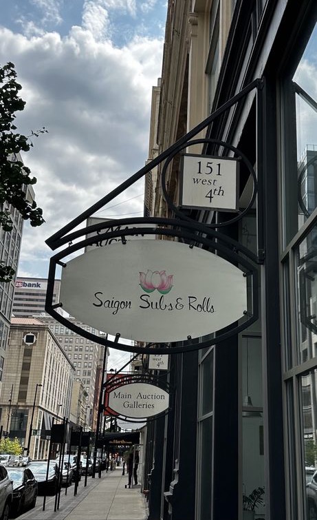 The Saigon Subs & Rolls hanging sign at 151 West 4th in downtown Cincinnati